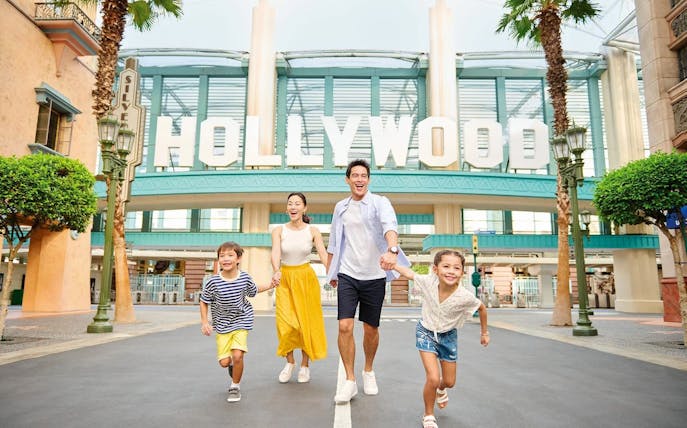 Family enjoying a day at Universal Studios Singapore's Hollywood zone.