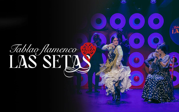 Flamenco dancer performing at Las Setas with musicians in the background.