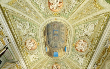 Doria Pamphilj Gallery ornate ceiling with frescoes and intricate carvings.