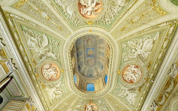 Doria Pamphilj Gallery ornate ceiling with intricate frescoes in Rome, Italy.