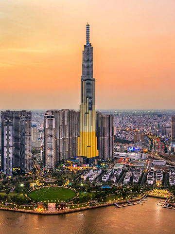 Aerial view of Landmark 81 in Ho Chi Minh City at sunset.