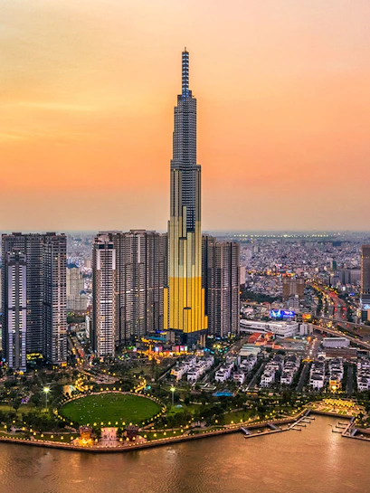 Aerial view of Landmark 81 in Ho Chi Minh City at sunset.