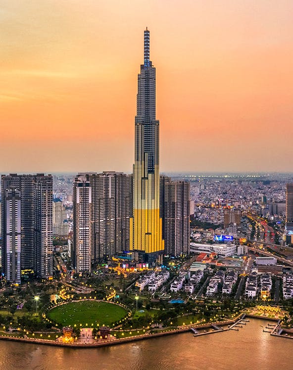 Aerial view of Landmark 81 in Ho Chi Minh City at sunset.