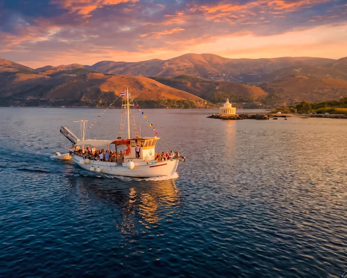 Argostoli Sunset Cruise with Vardiani Island Swim Stop, Greek Buffet and Unlimited Wine