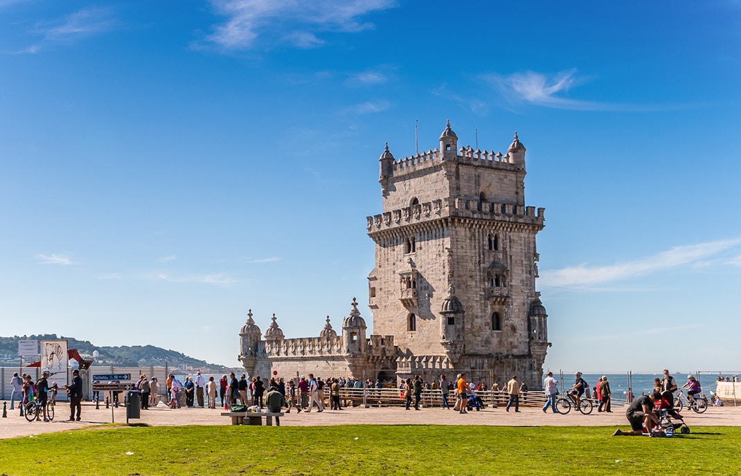 View of the historic Belem Tower in Lisbon, Portugal, a popular tourist attraction included in the skip-the-line e-ticket with audio tour