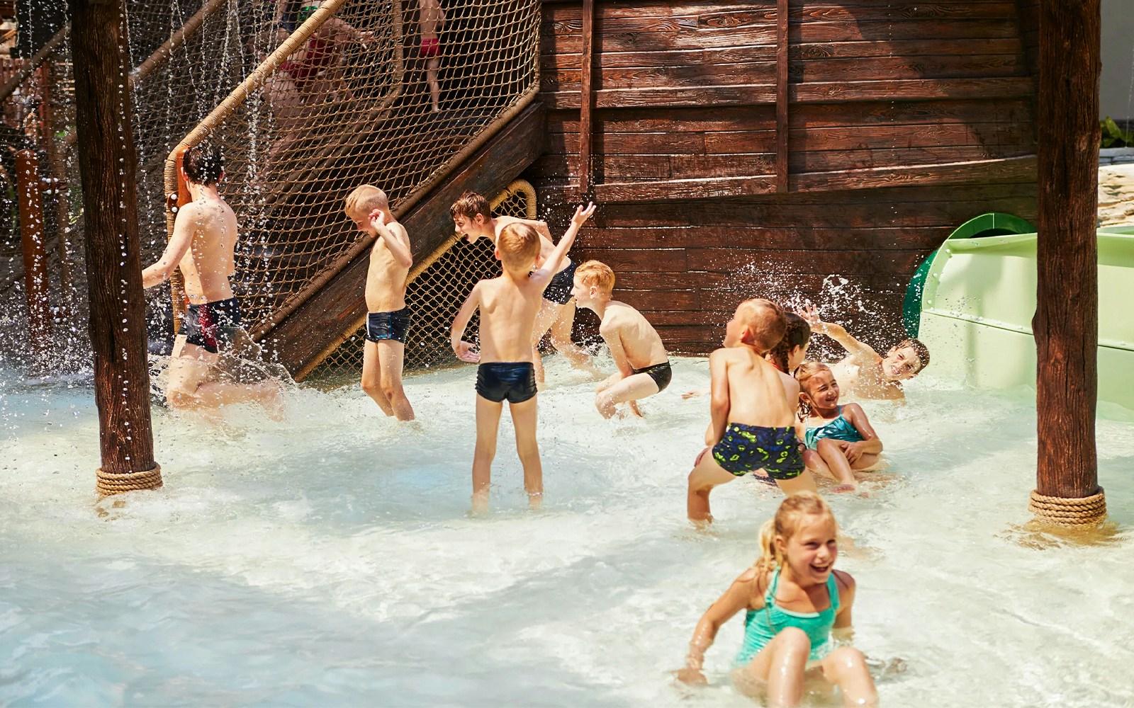 Children enjoying water play area at Bellewaerde Aquapark, Belgium.