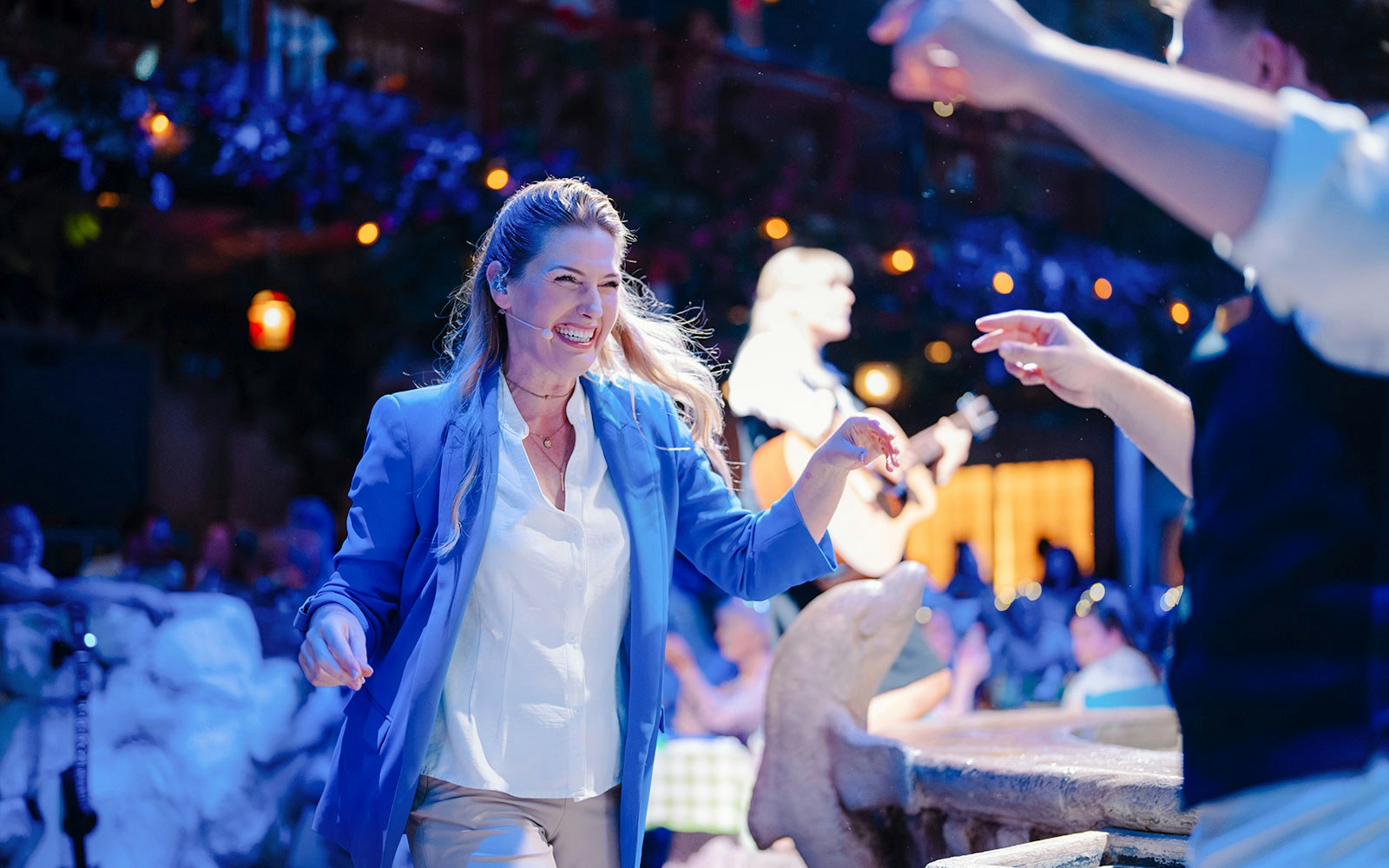 Guests enjoying live music at Mamma Mia! The Party event.