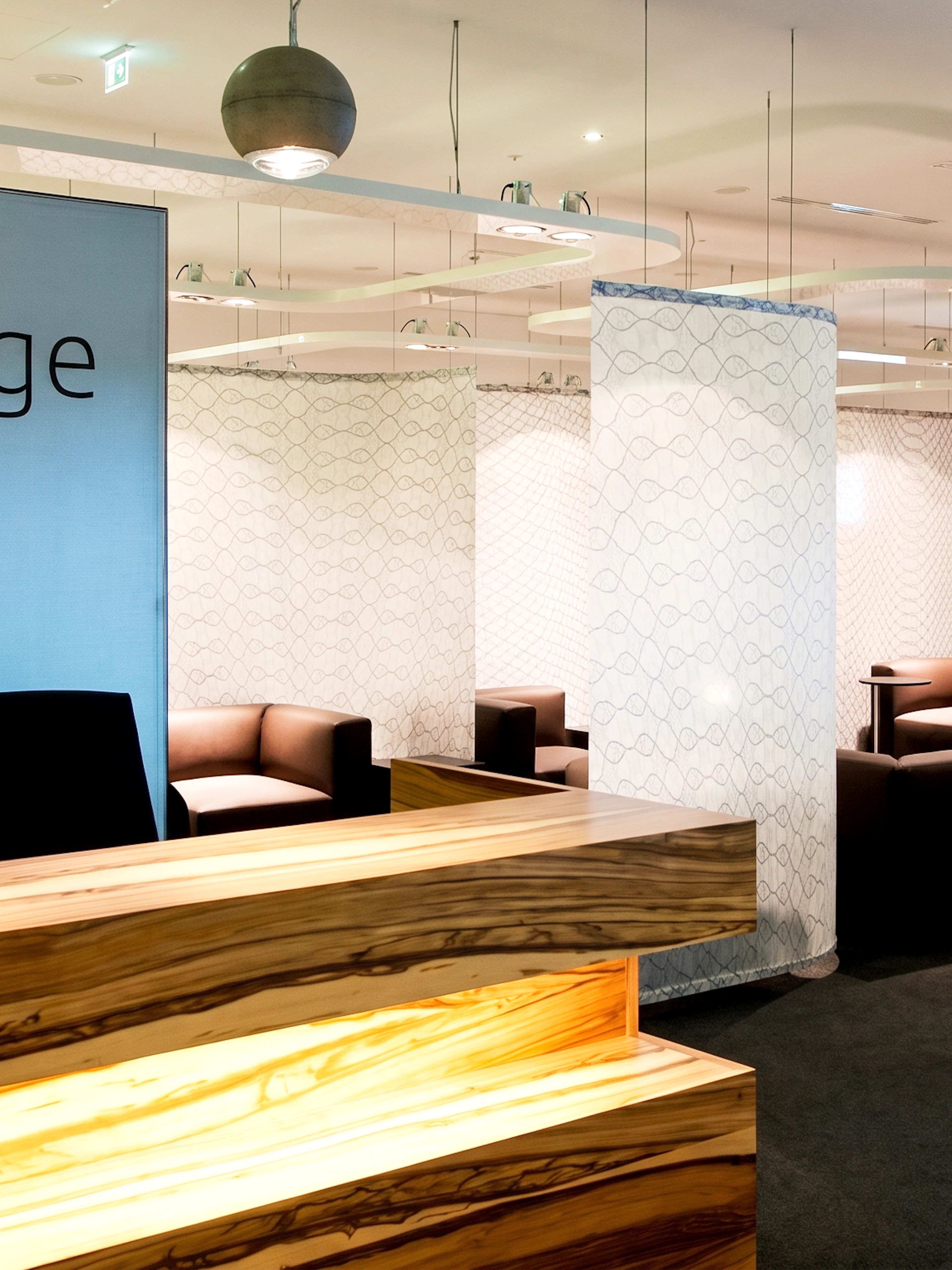 SKY Lounge seating area at Vienna Airport Terminal 3 with modern decor.