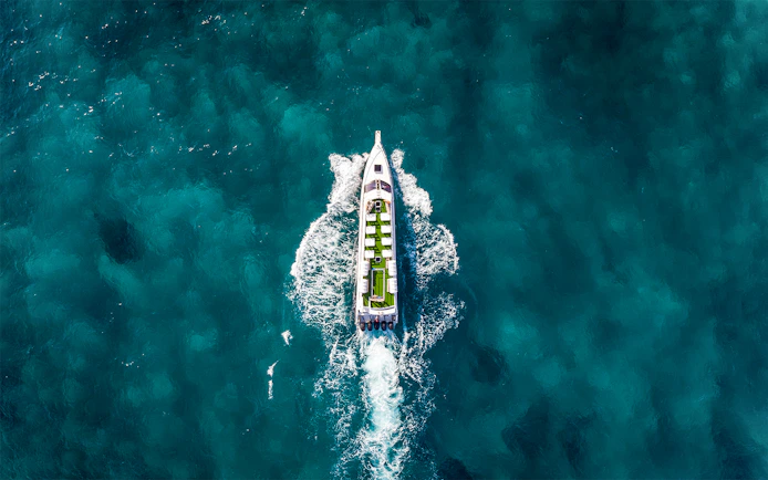 Fast boat traveling between Bali, Nusa Penida, Gili Islands, and Lombok.