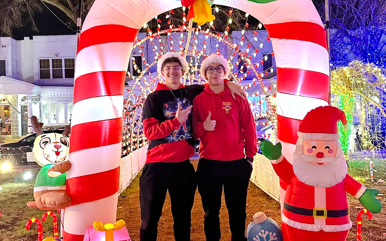 Holiday lights display with candy cane arch and Santa figure in Philadelphia.