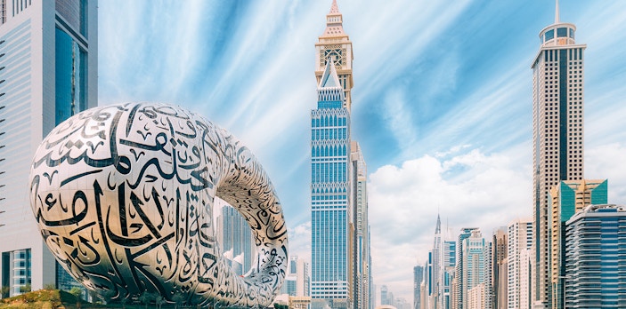 Museum of the Future in Dubai with surrounding skyscrapers.