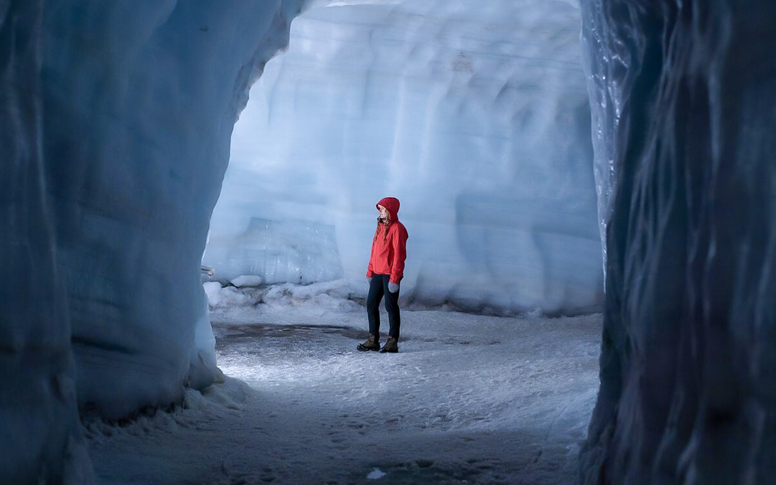 Guest exploring Langjokull ice tunnel in Iceland.