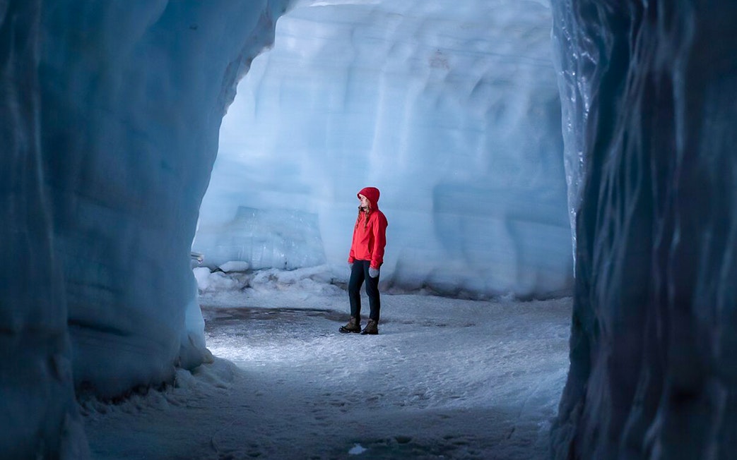 Guest exploring Langjokull ice tunnel in Iceland.