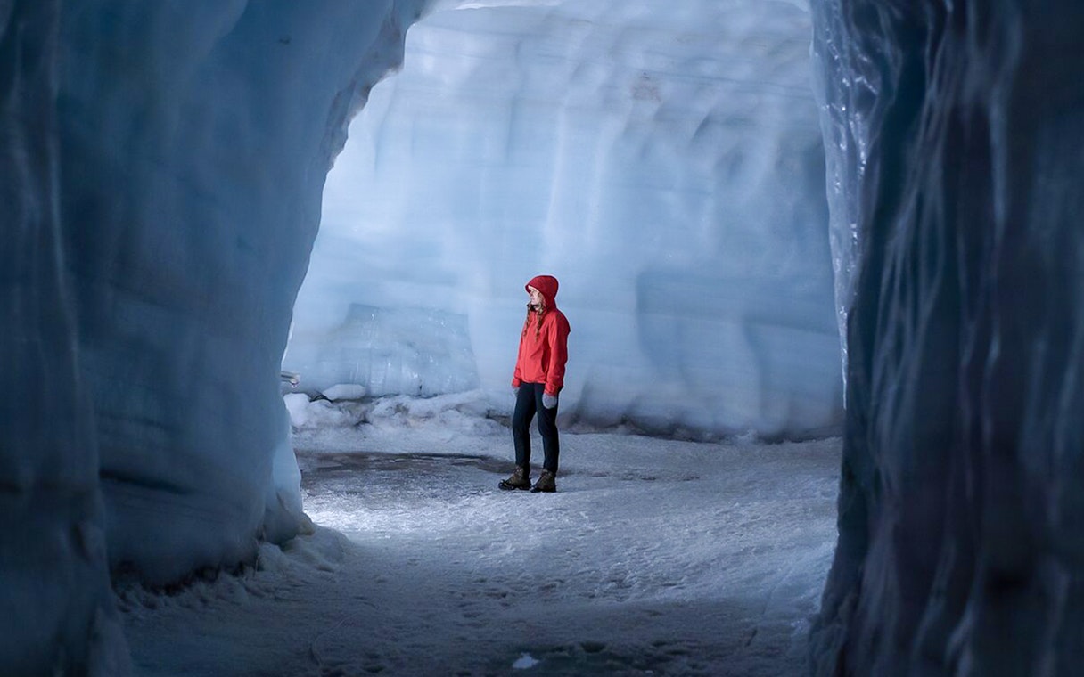 Guest exploring Langjokull ice tunnel in Iceland.