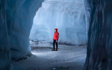 Guest exploring Langjokull ice tunnel in Iceland.