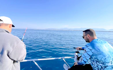 From Side: Open-Sea Fishing Trip with Hotel Transfers