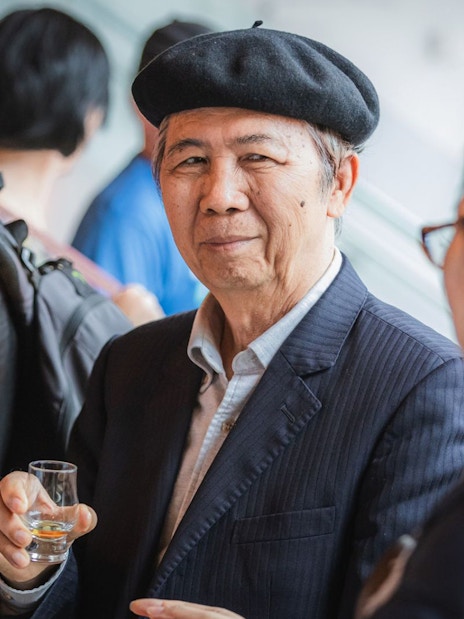 Visitors enjoying whisky tasting on Edinburgh day tour.