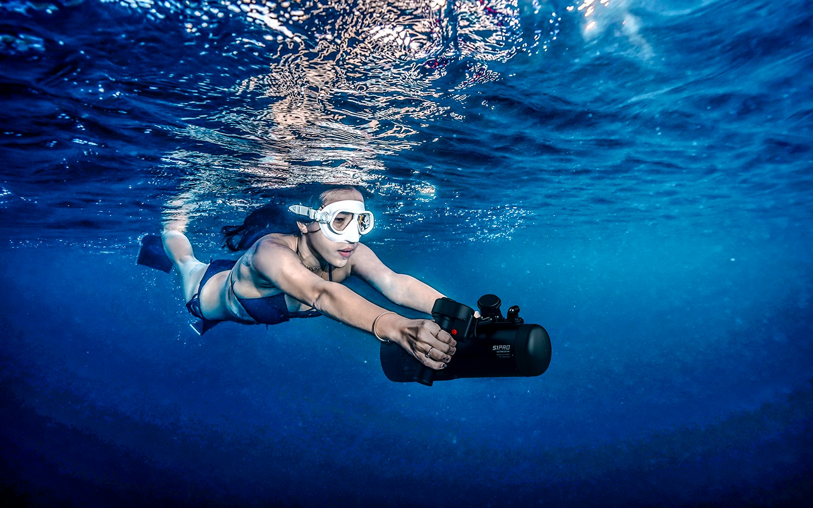 Person using an underwater scooter in Saint-Jean-Cap-Ferrat, Nice, France.