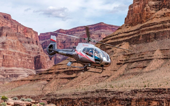Helicopter flying over the Grand Canyon West during a tour.
