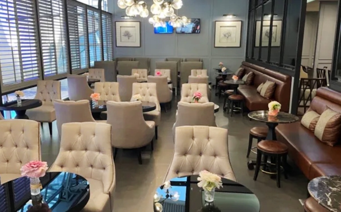 Coral First Class Lounge seating area at Phuket International Airport.