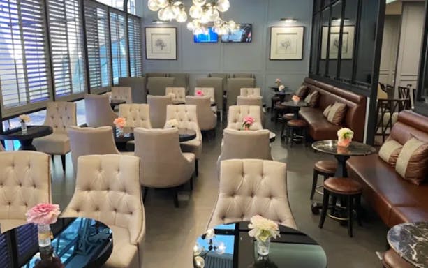 Coral First Class Lounge seating area at Phuket International Airport.