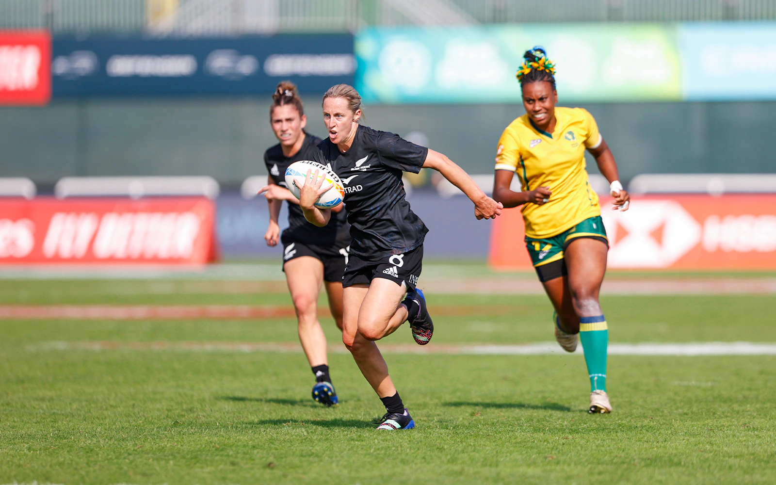 Rugby players in action at Emirates Dubai 7s tournament.