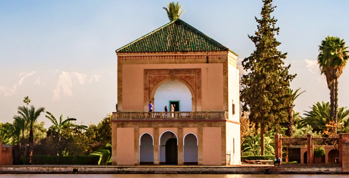 Menara Gardens pavilion with Atlas Mountains in Marrakech, Morocco.