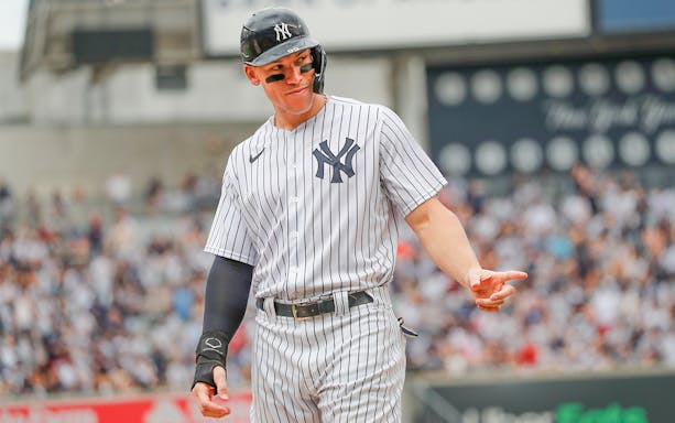 Baseball player in New York Yankees uniform during game against Arizona Diamondbacks, September 2023.