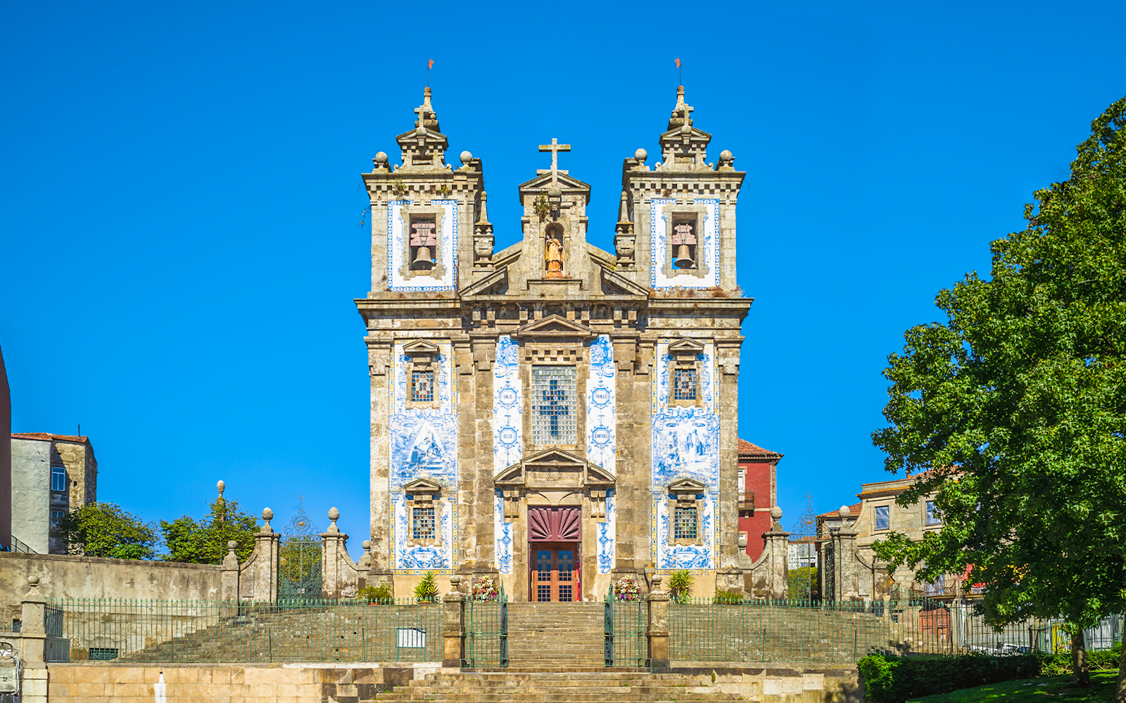 Church of Saint Ildefonso facade with blue azulejos in Porto, Portugal.