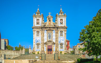 Church of Saint Ildefonso facade with blue azulejos in Porto, Portugal.