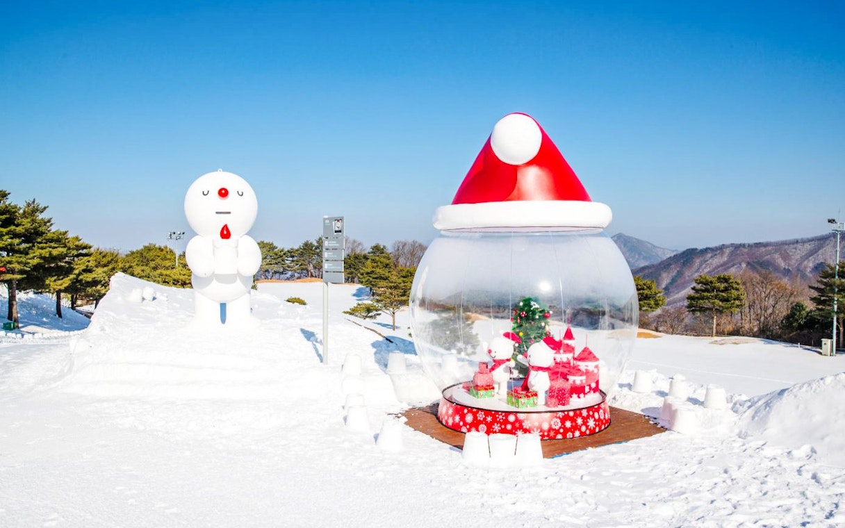 Snowman display at Vivaldi Park Ski Resort with festive decorations and snowy landscape.