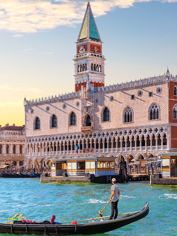 Gondola on canal in front of Doge's Palace, Venice.