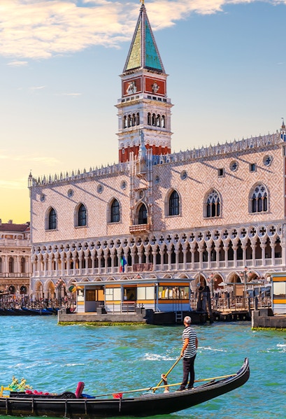 Gondola on canal in front of Doge's Palace, Venice.