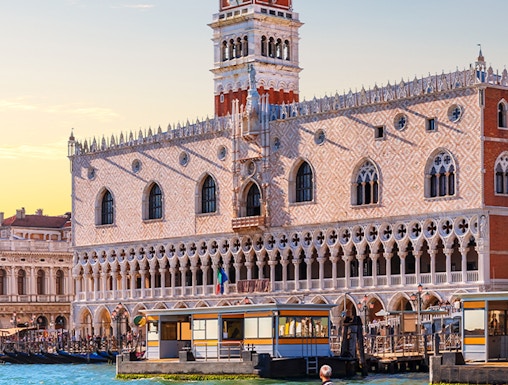Gondola on canal in front of Doge's Palace, Venice.