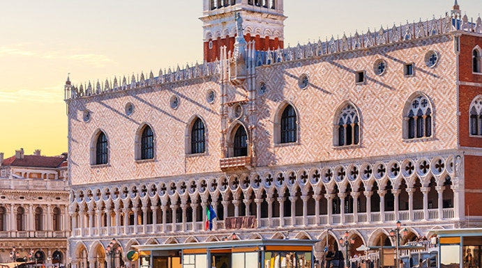 Gondola on canal in front of Doge's Palace, Venice.