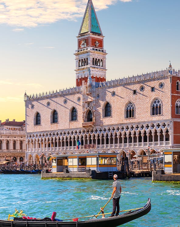 Gondola on canal in front of Doge's Palace, Venice.