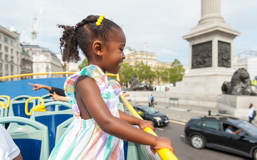 Children on a Tootbus tour in London, near Trafalgar Square.