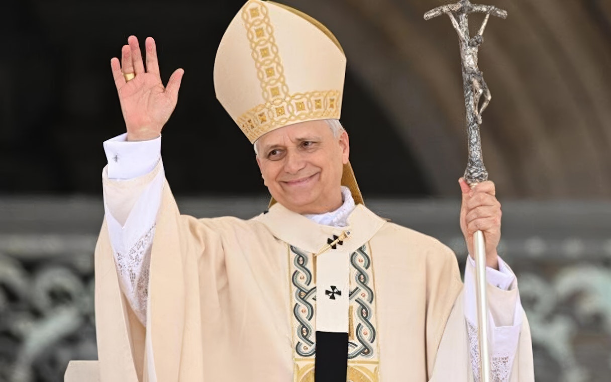 Pope Leo XIV waving during Papal Audience in Vatican City.