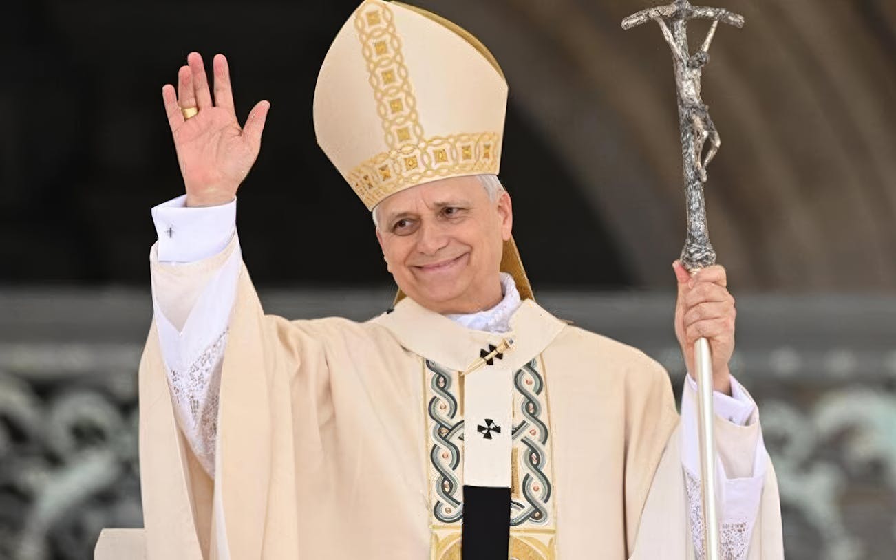 Pope Leo XIV waving during Papal Audience in Vatican City.