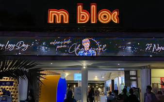 M Bloc Space entrance at night during Jakarta City Walking Tour by MRT.