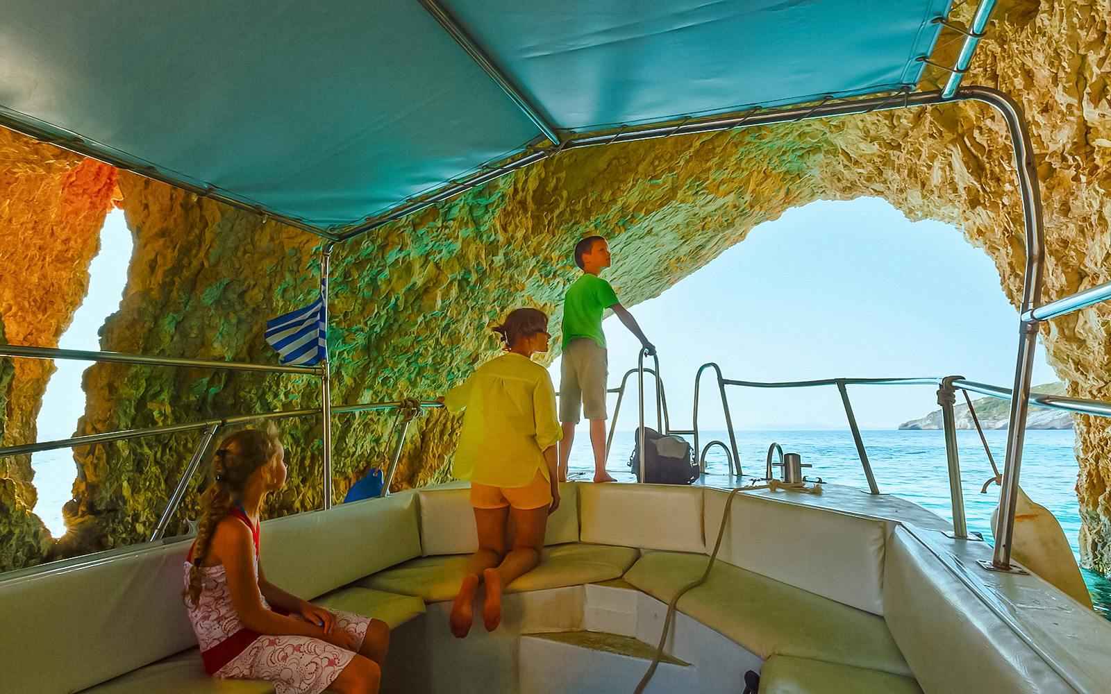 Boat tour exploring the Blue Caves in Zakynthos, Greece.