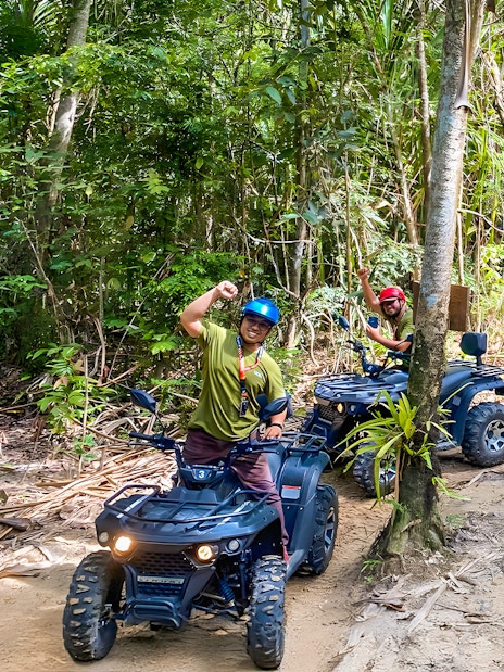 ATV riders on a forest trail during Langkawi Sky ATV Ride at Mountain Manchinchang.