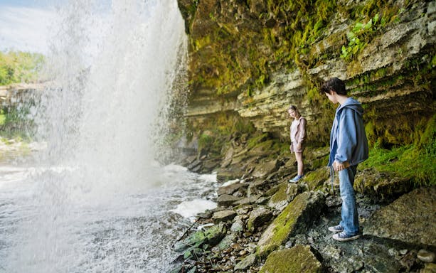 Girls exploring near Jagala Waterfall, Estonia's widest natural waterfall.