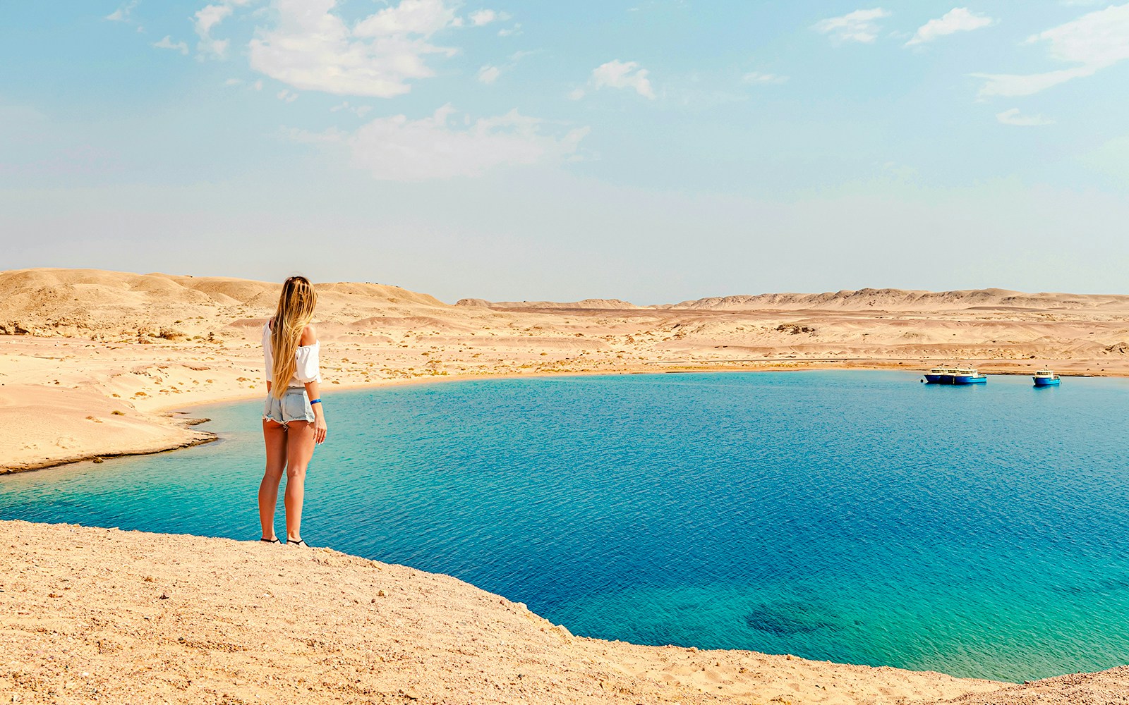 Woman overlooking Magic Lake at Ras Mohamed National Park, Egypt.