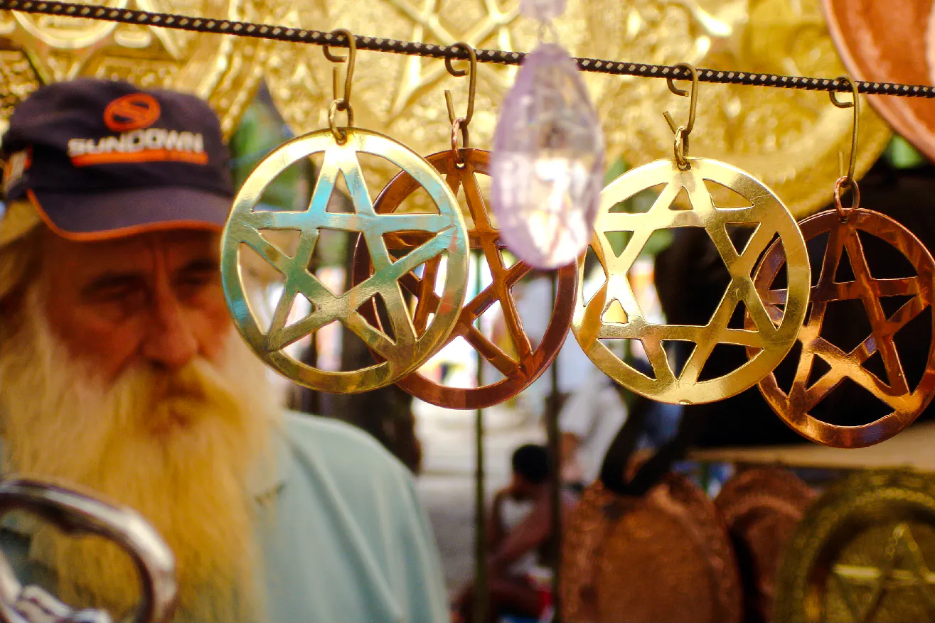 Hanging metal star ornaments at Ipanema Street Market, Rio de Janeiro.