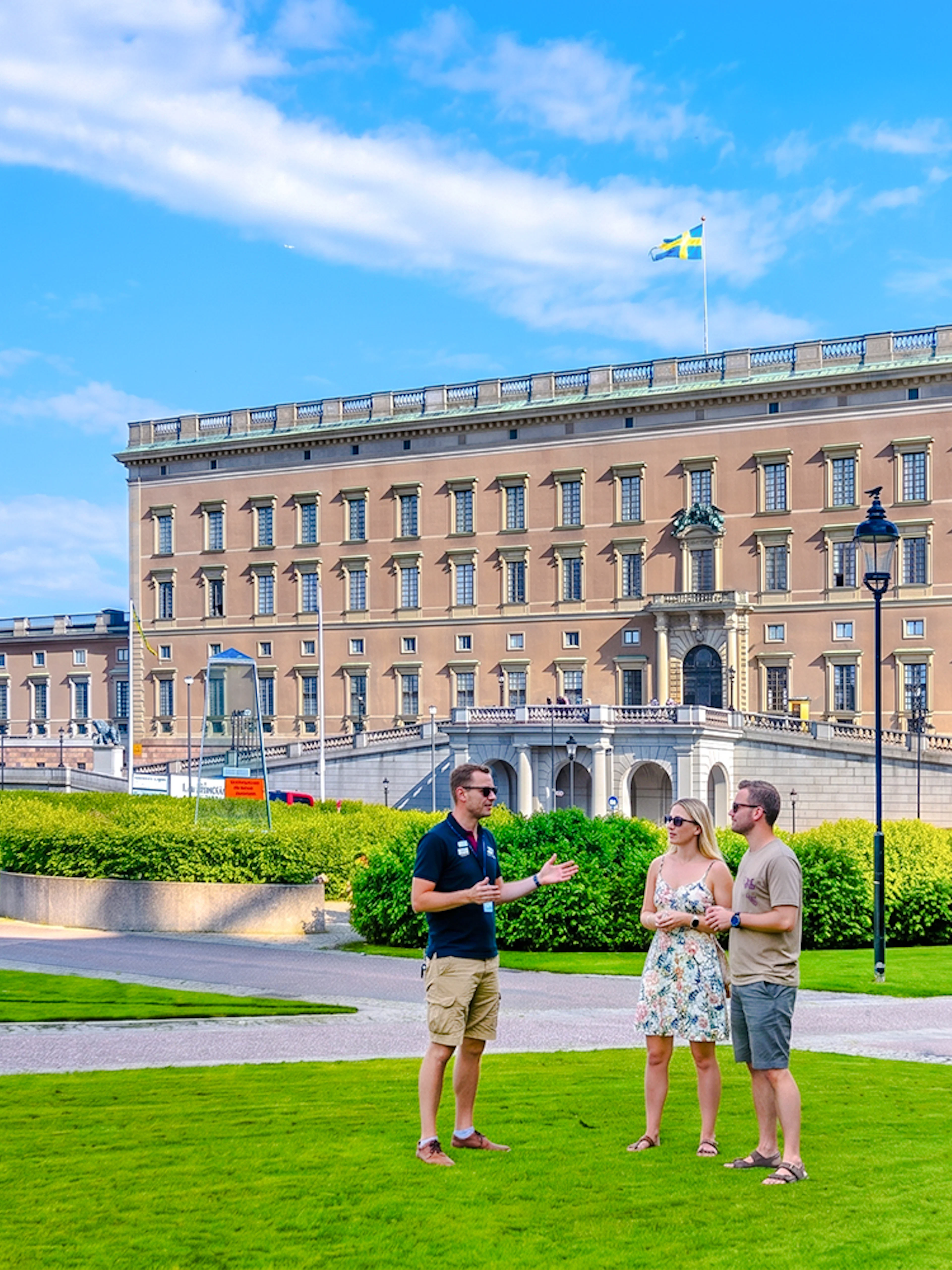 Tour group in front of the Royal Palace of Sweden, Stockholm.