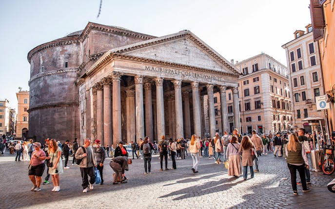 Pantheon in Rome with tourists gathered outside, part of a guided minivan tour.