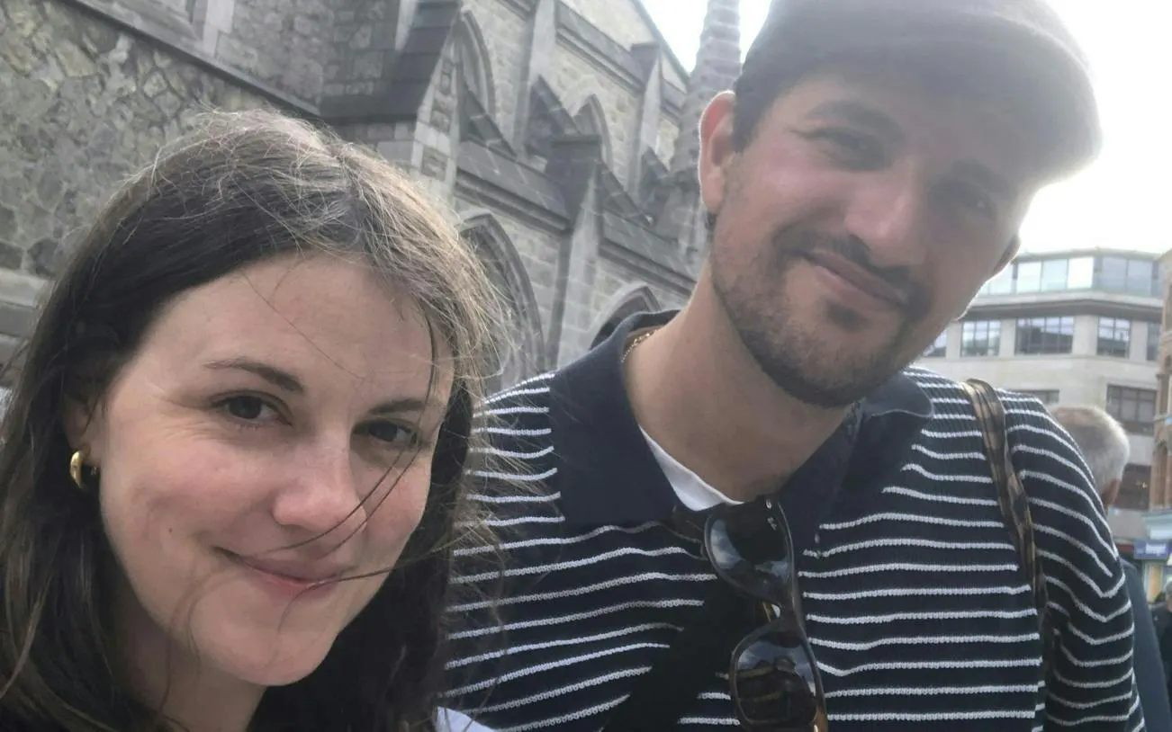 Couple exploring Dublin during a murder mystery city game.