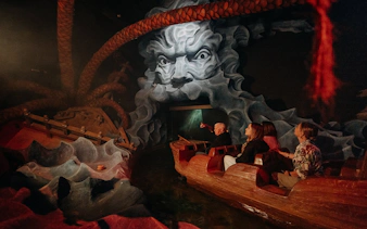Visitors on a boat ride at World of Discoveries Interactive Digital Exhibition.