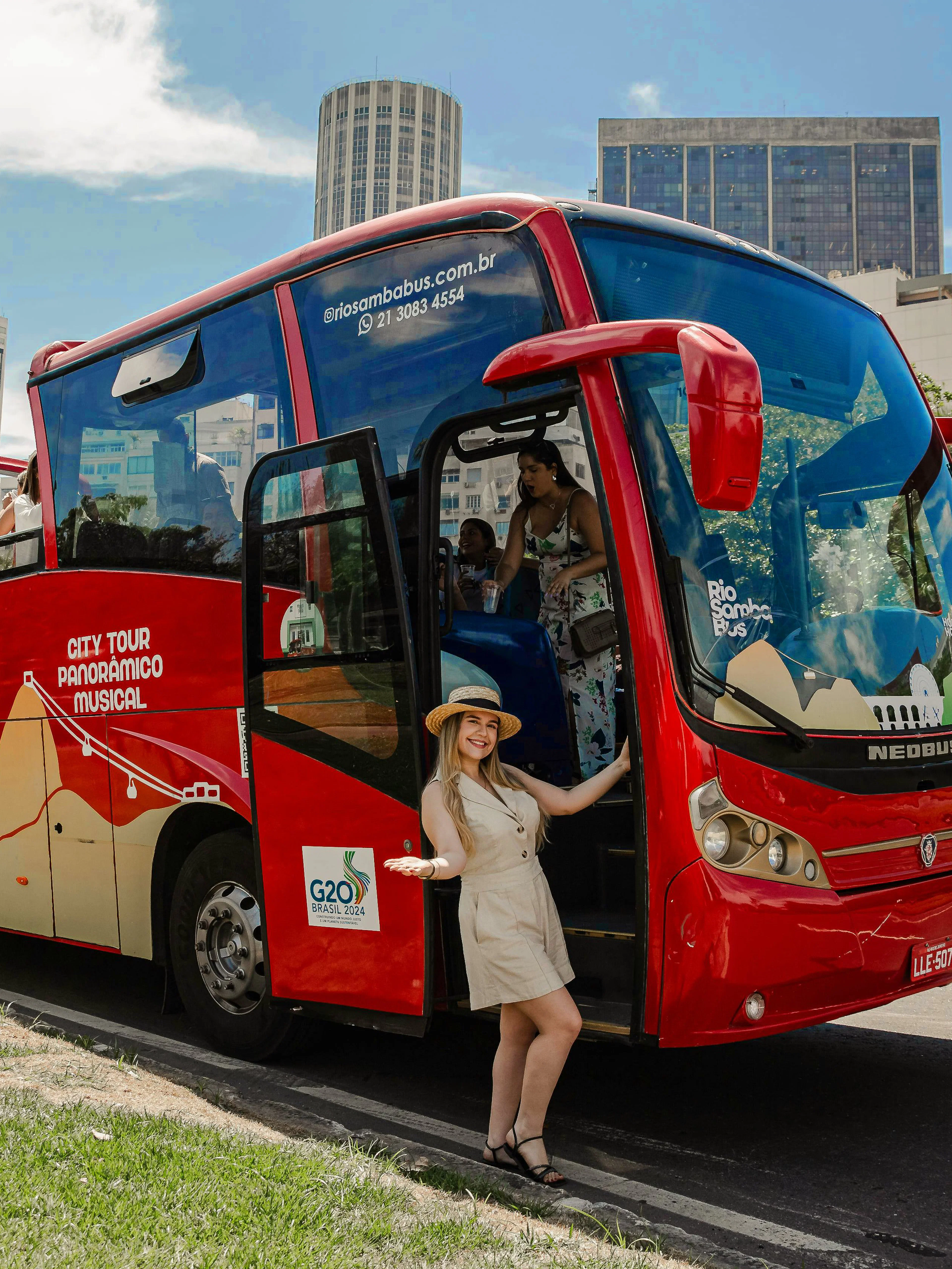 Rio Samba Bus with tourists on a hop-on hop-off tour in Rio de Janeiro.